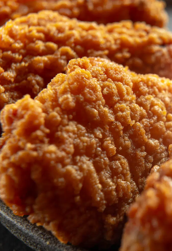 Close up of breaded fried chicken from KFC