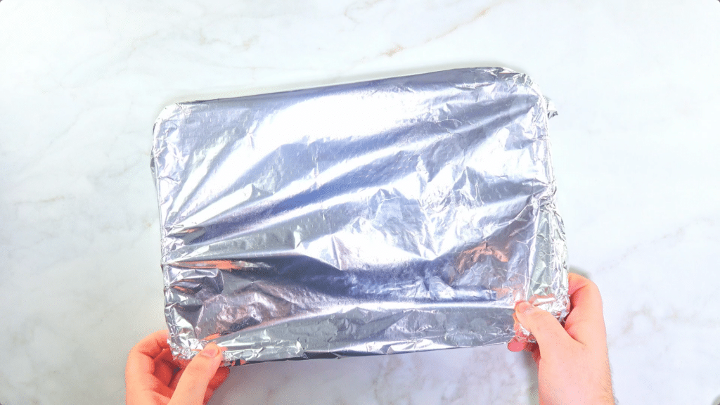 Sausages covered with foil