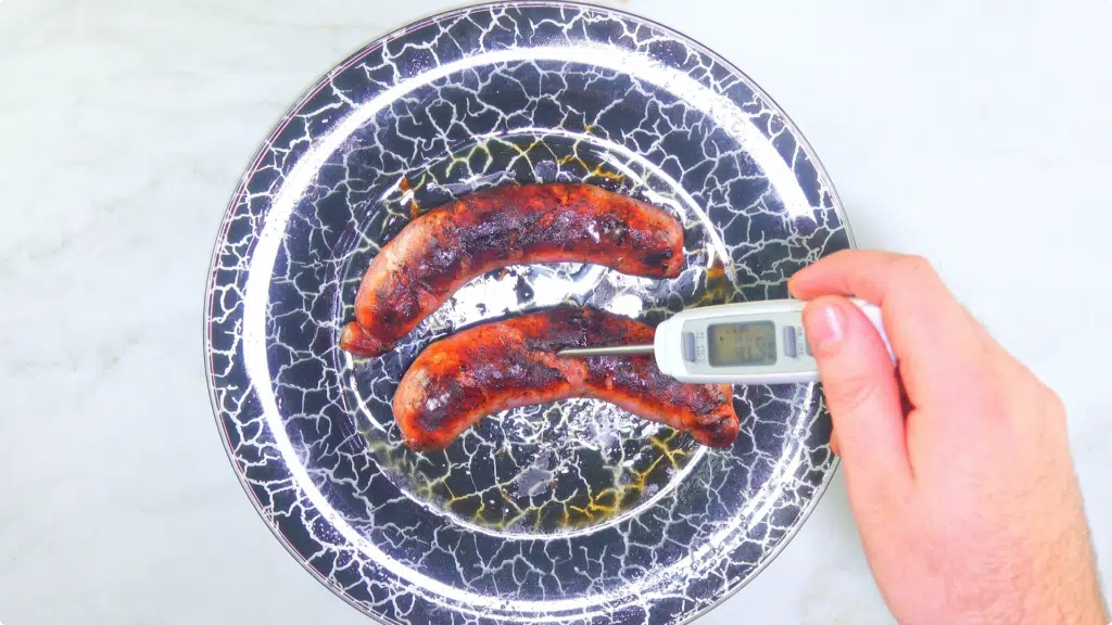 Checking temp of sausages internally