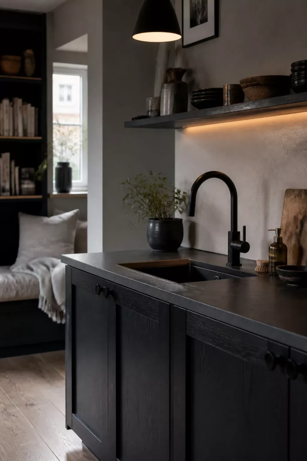 Matte black kitchen faucet on a dark charcoal shaker island with under-shelf LED lighting — black kitchen faucets inspiration.