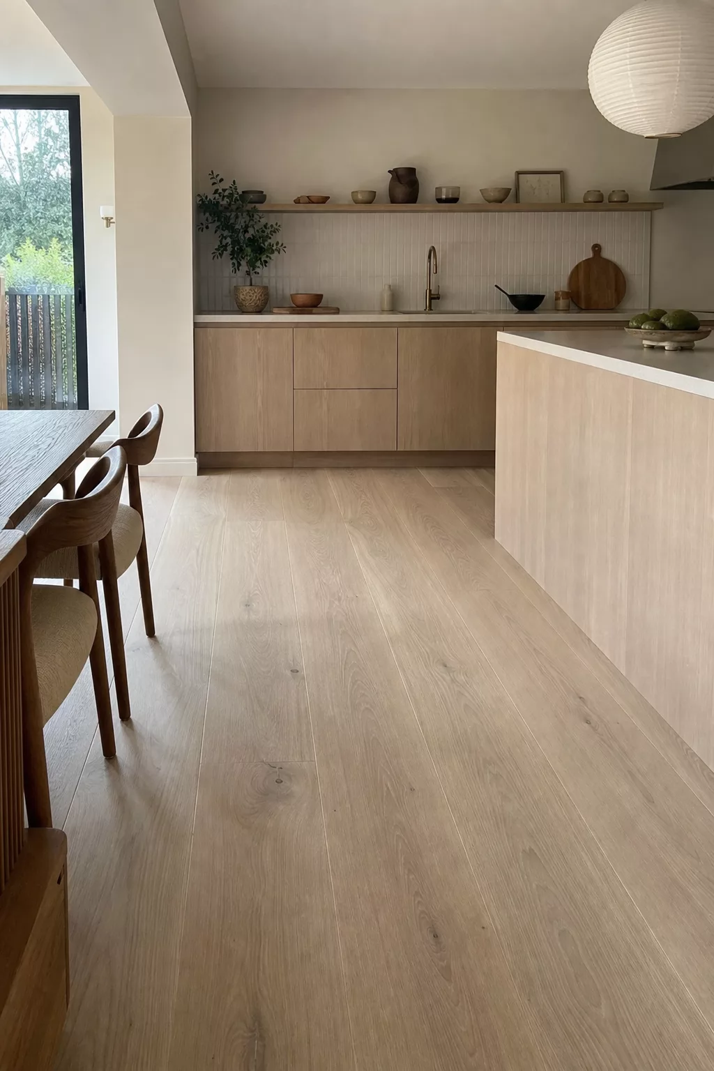 Japandi Kitchen Floor Ideas shown with pale ash wide-plank oak flooring