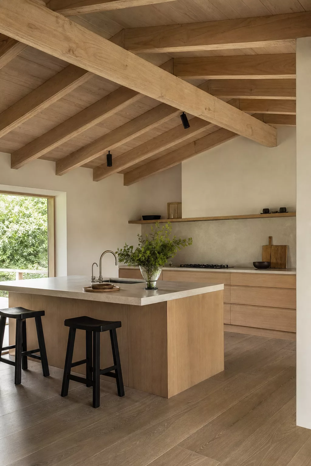 Angled exposed wood beams over island in a minimalist Japandi kitchen design