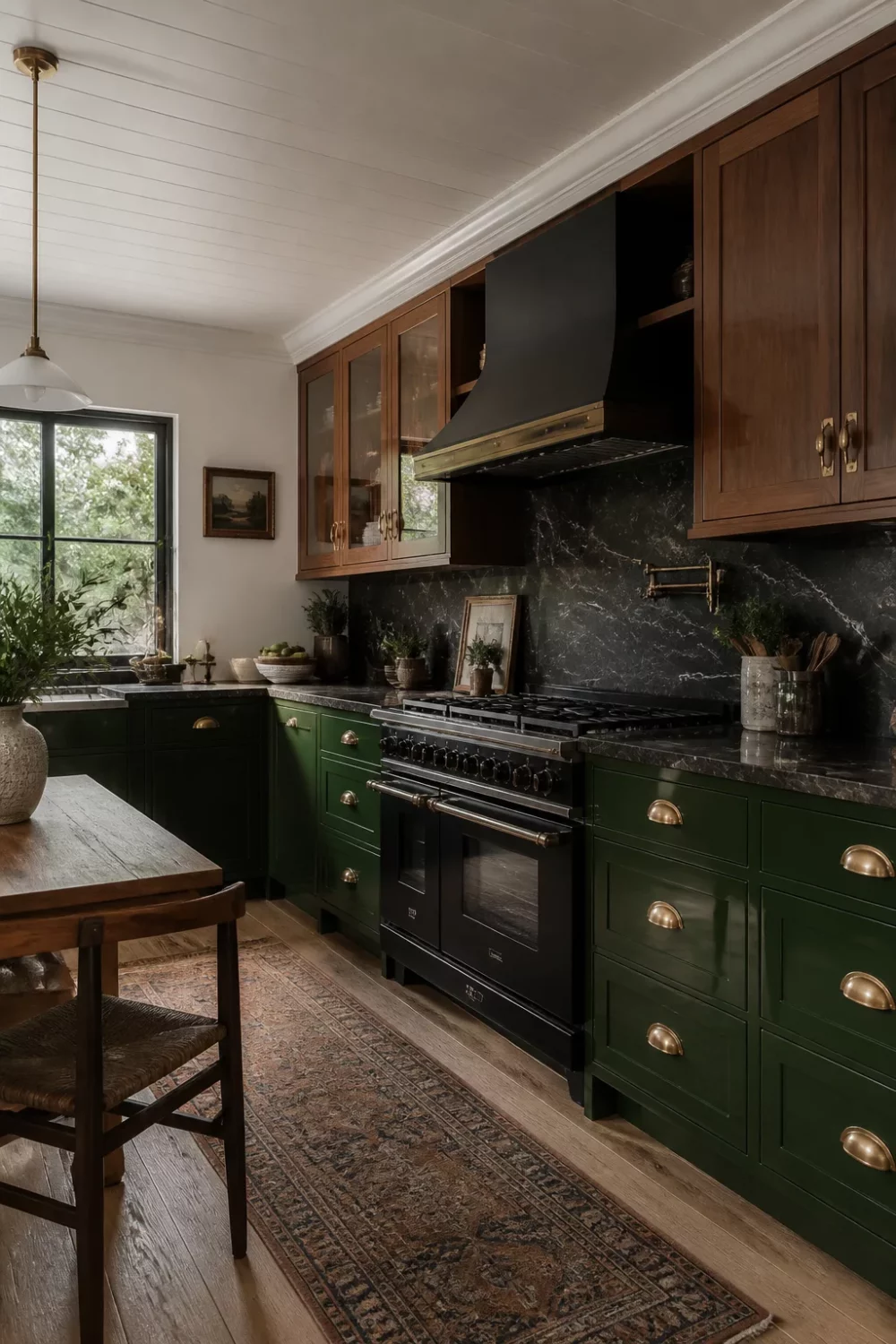 Two tone kitchen cabinets green and wood — racing green lowers, smoked walnut uppers, brass hardware, black marble backsplash