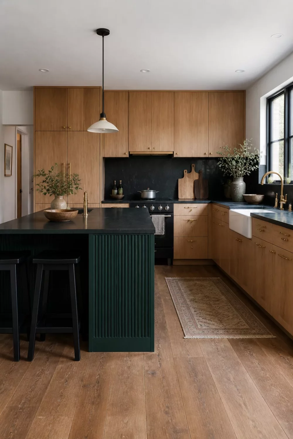 Two tone kitchen cabinets green and wood with dark emerald fluted island and flat-front oak cabinetry